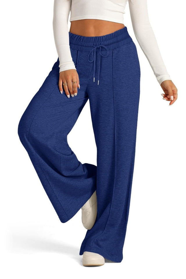 Drawstring elastic waist wide leg pants with pockets, opaque.