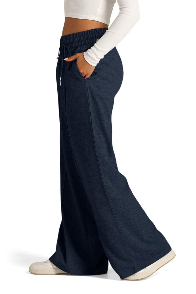 Drawstring elastic waist wide leg pants with pockets, opaque.