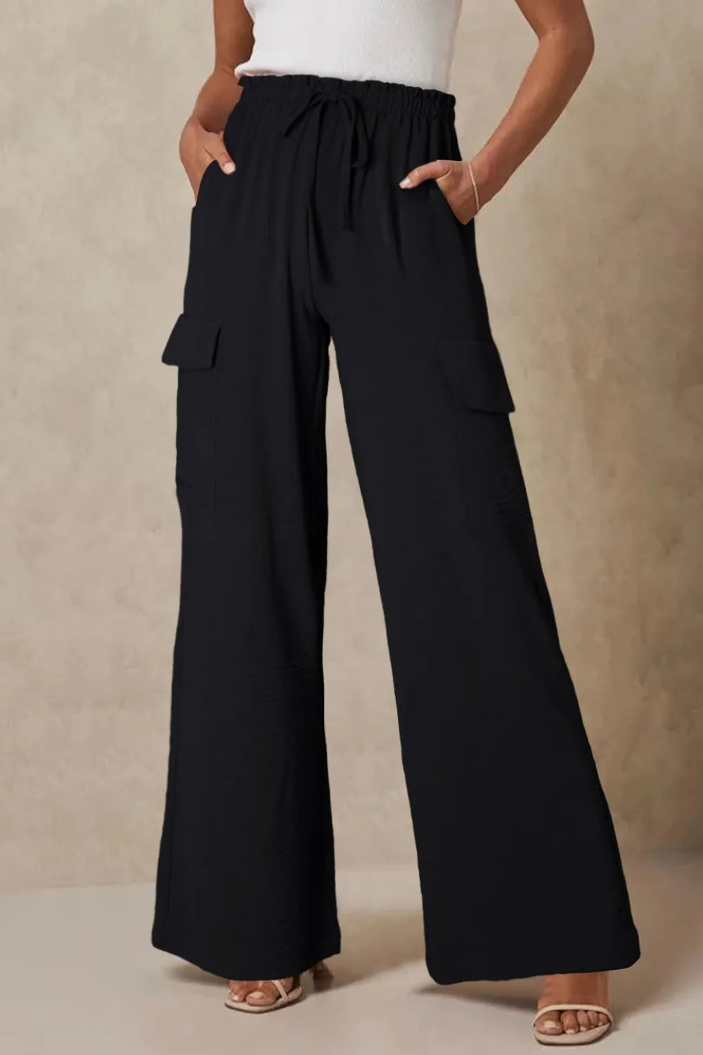 Drawstring frilled waist wide leg utility trousers with pockets.