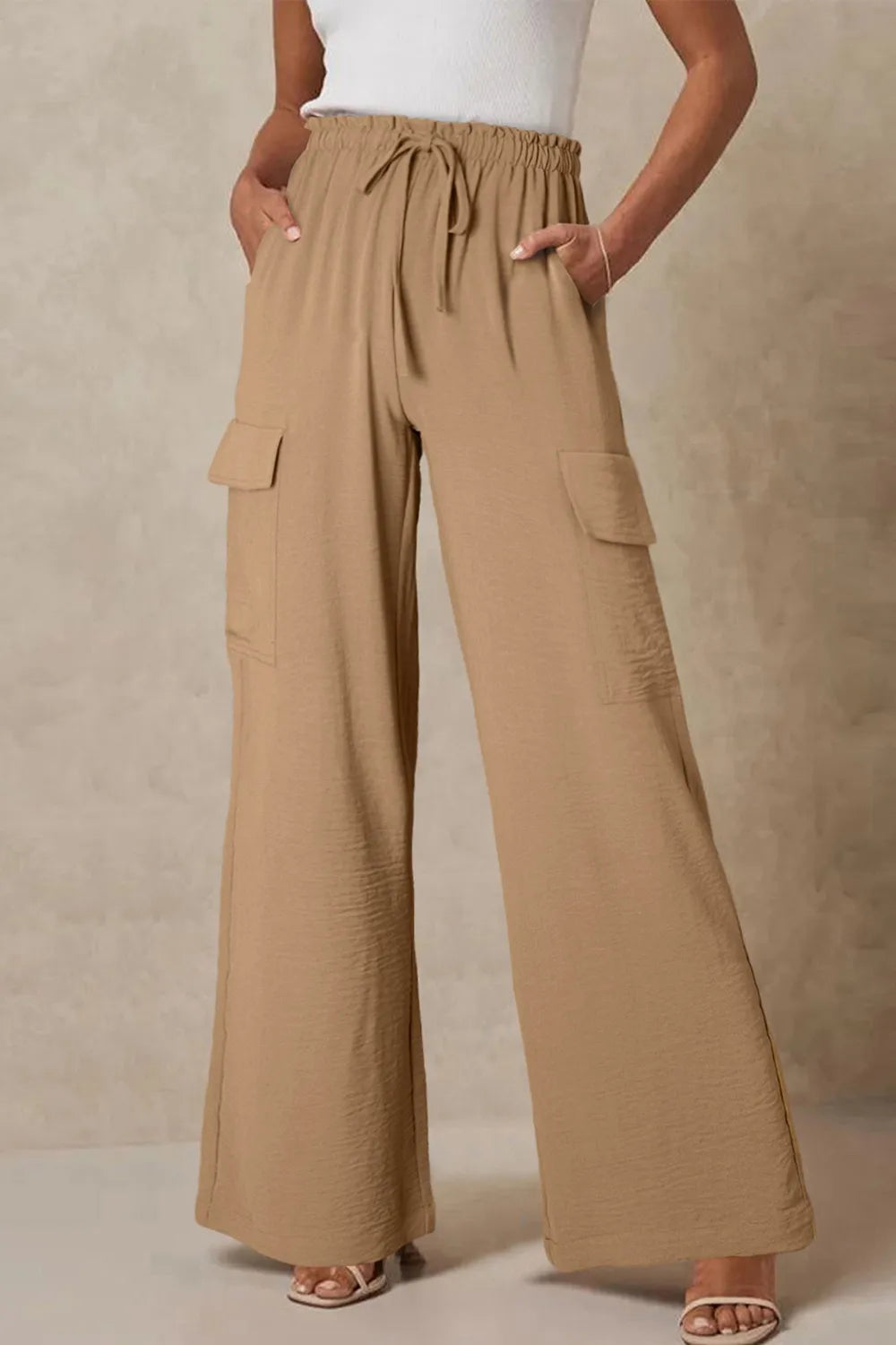 Drawstring frilled waist wide leg utility trousers with pockets.