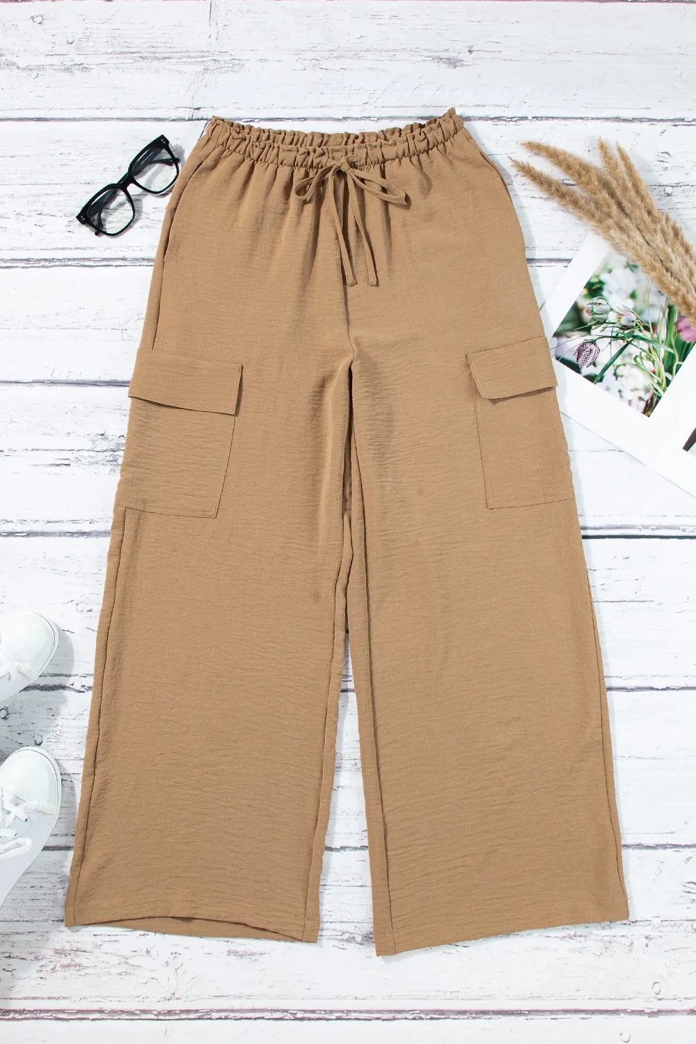 Drawstring frilled waist wide leg utility trousers with pockets.