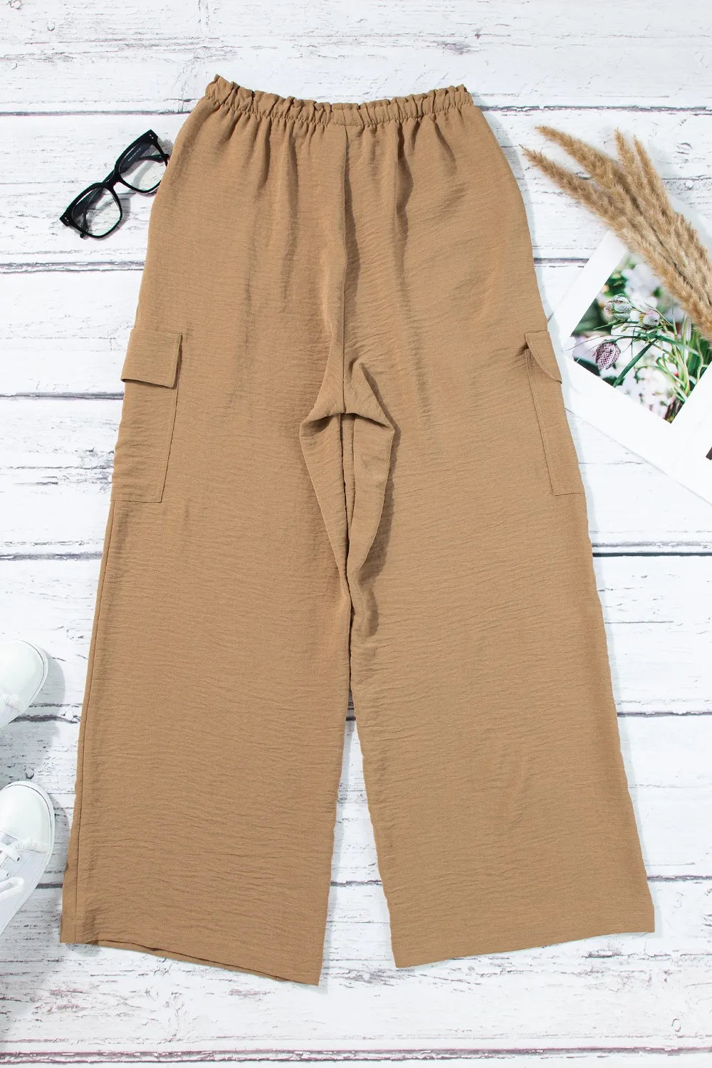 Drawstring frilled waist wide leg utility trousers with pockets.