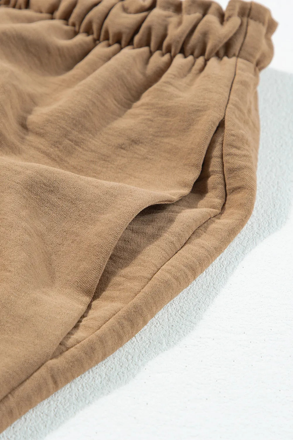 Drawstring frilled waist wide leg utility trousers with pockets.
