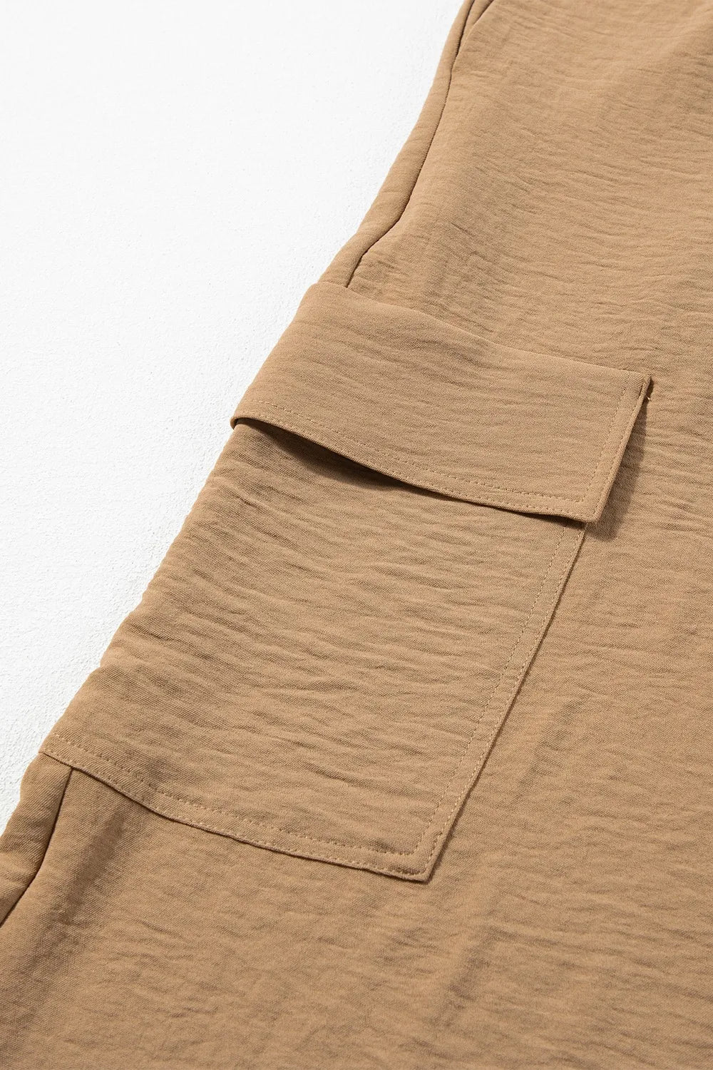 Drawstring frilled waist wide leg utility trousers with pockets.