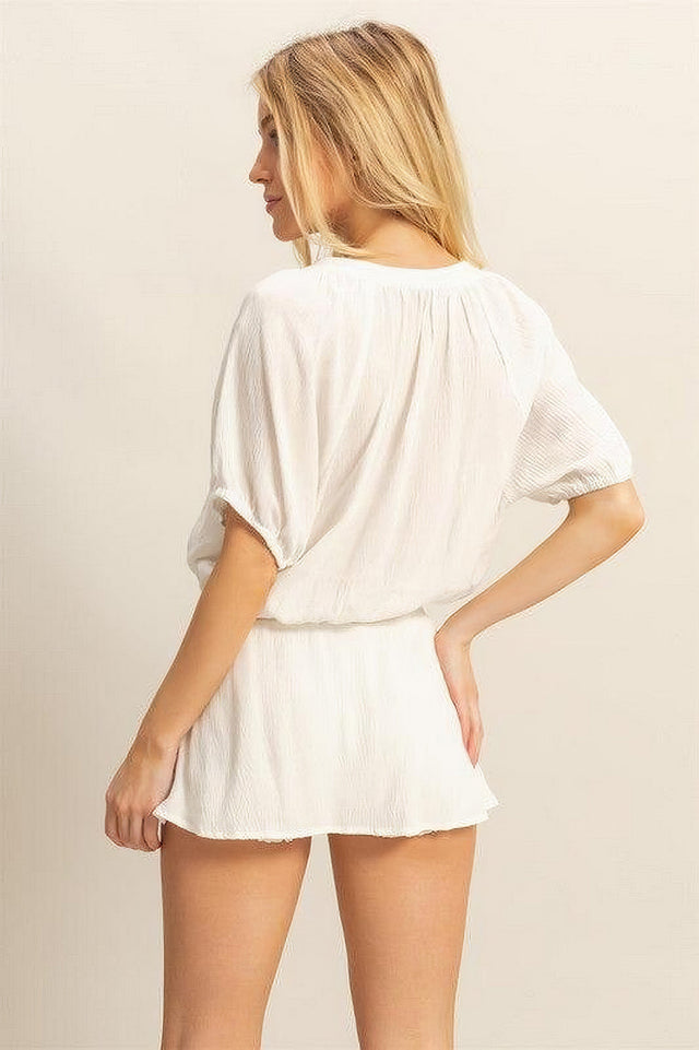 Women's short sleeve top and skort set with drawstring hem and button details
