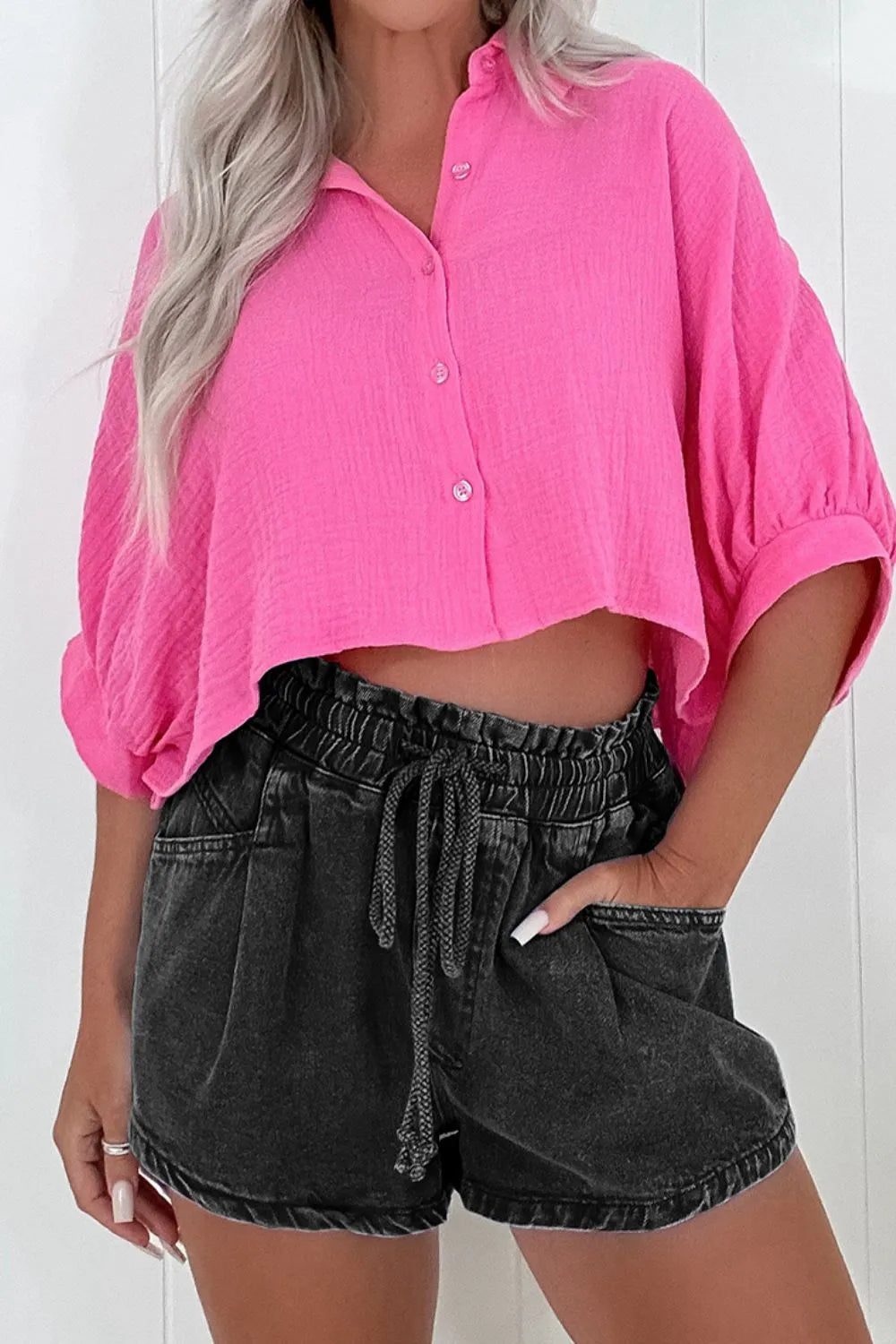 Drawstring high-waist denim shorts with pockets.