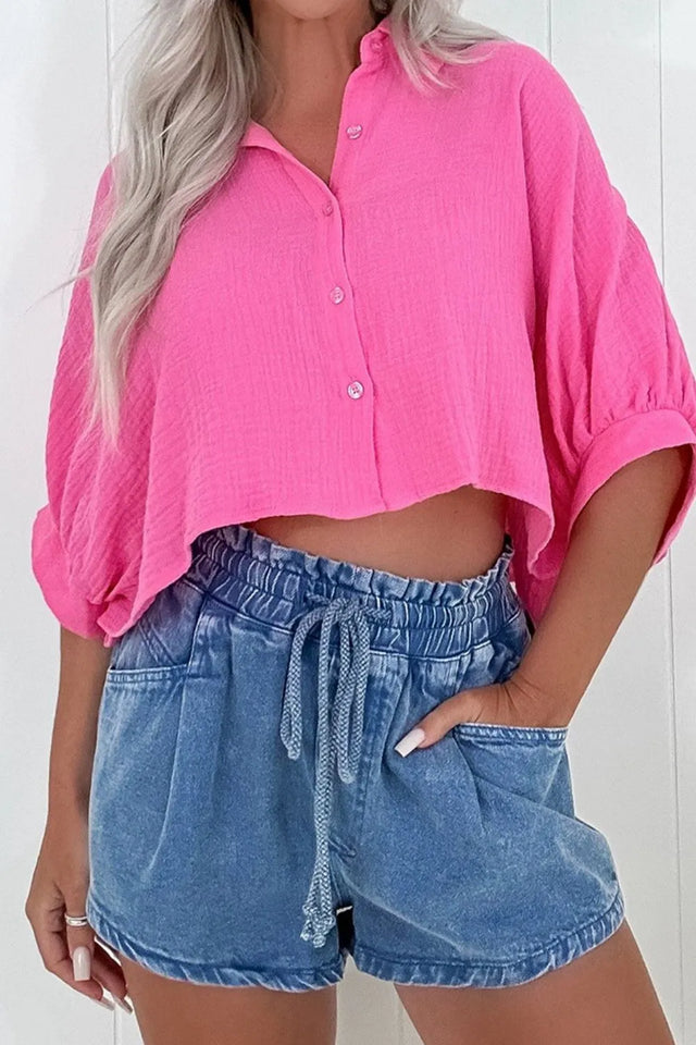 Drawstring high-waist denim shorts with pockets.
