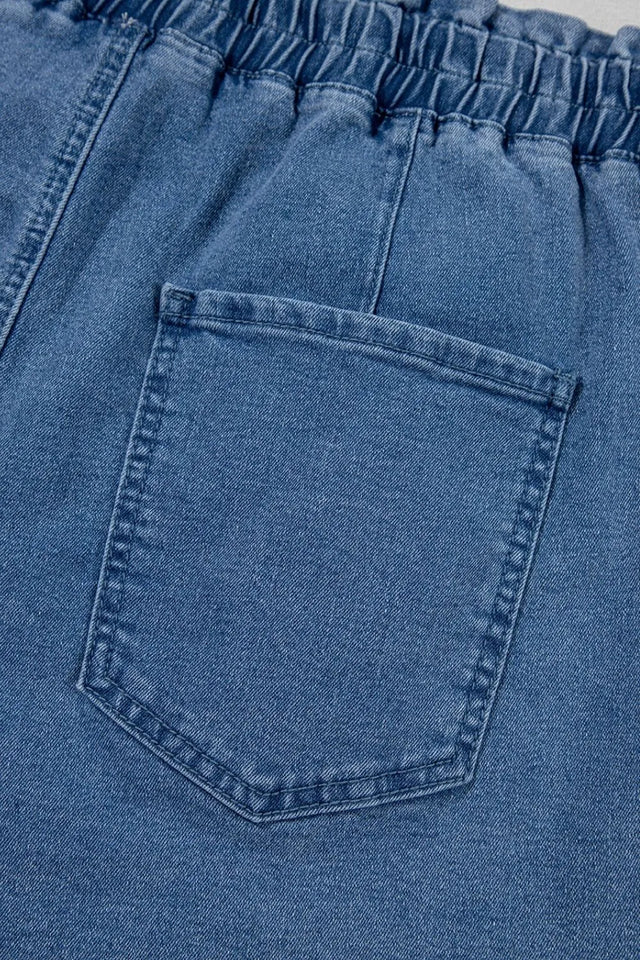 Drawstring high-waist denim shorts with pockets.