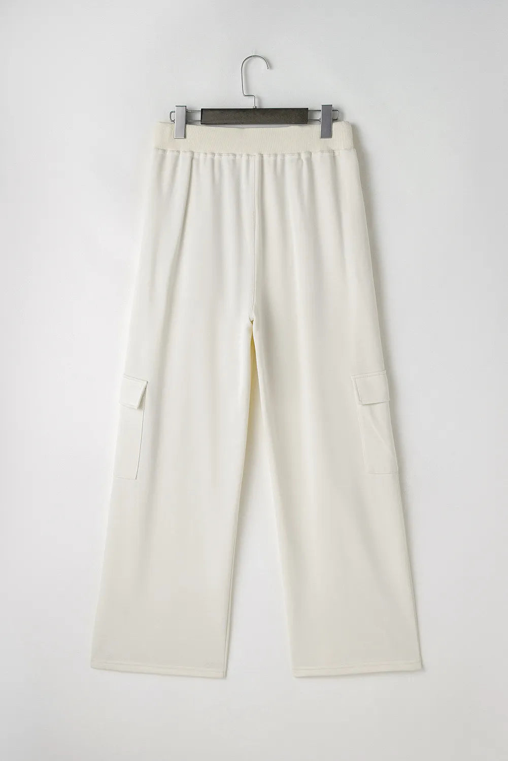 Drawstring high waist pants with pockets, opaque.