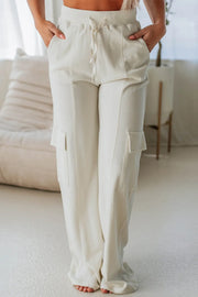 Drawstring high waist pants with pockets, opaque.