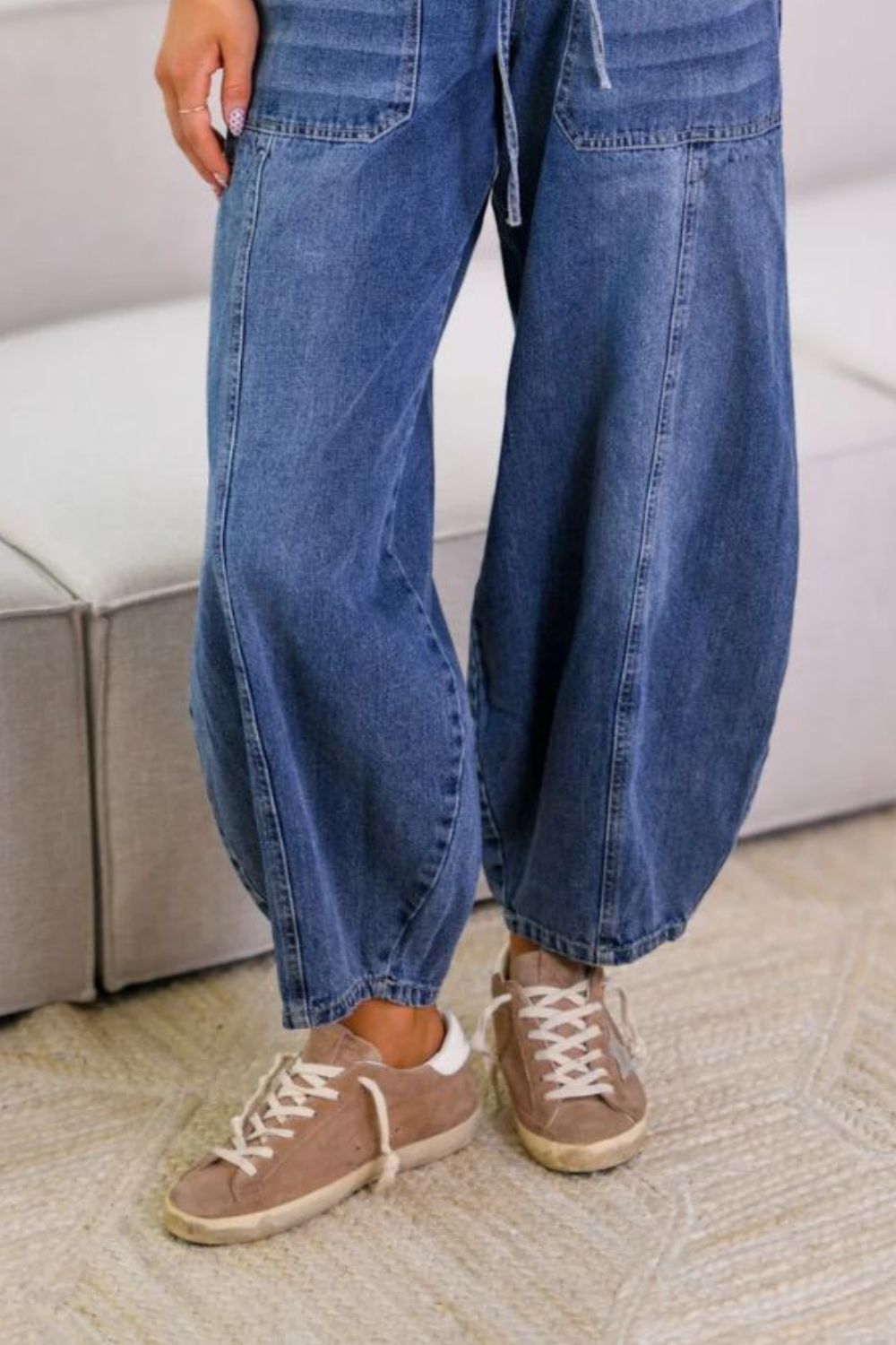 Drawstring jeans with pockets.