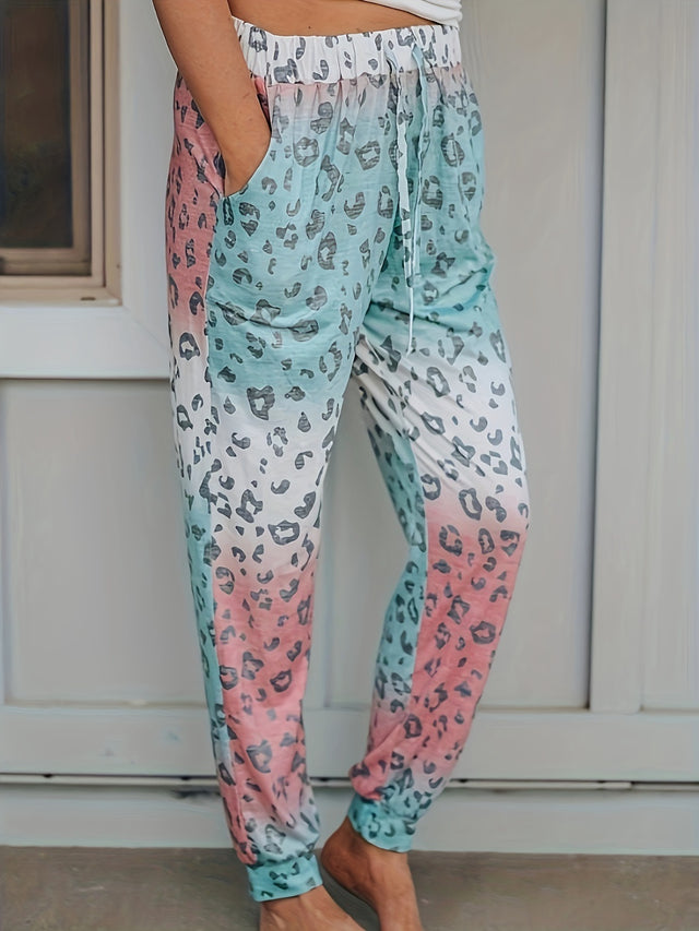 Drawstring leopard pants with pockets, opaque.