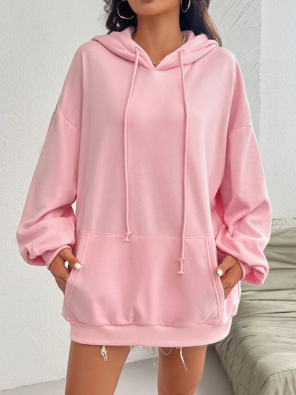 Drawstring long sleeve hoodie with pockets.