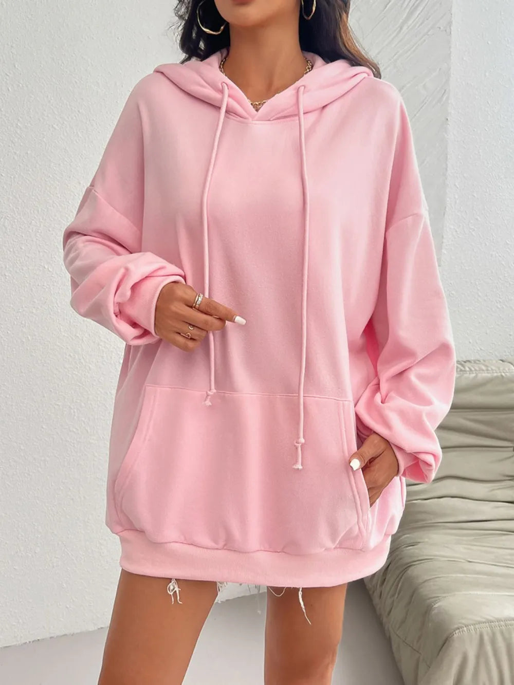 Drawstring long sleeve hoodie with pockets.
