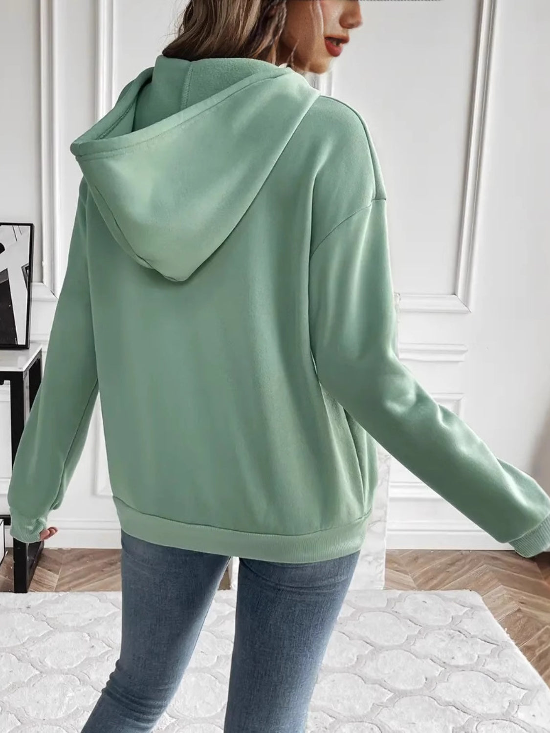Drawstring long sleeve hoodie with kangaroo pocket.