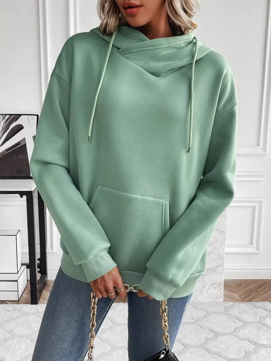 Drawstring long sleeve hoodie with kangaroo pocket.