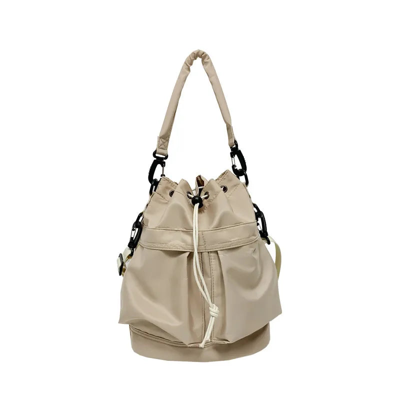 Medium nylon drawstring bucket bag.