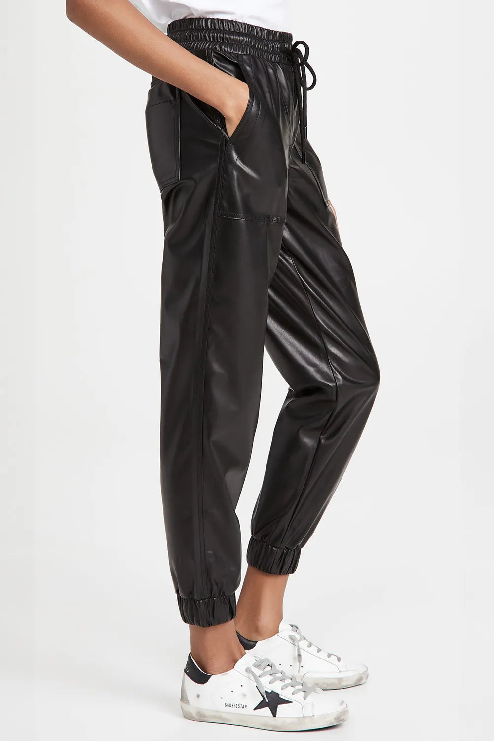 Drawstring PU leather pants with pockets, opaque.