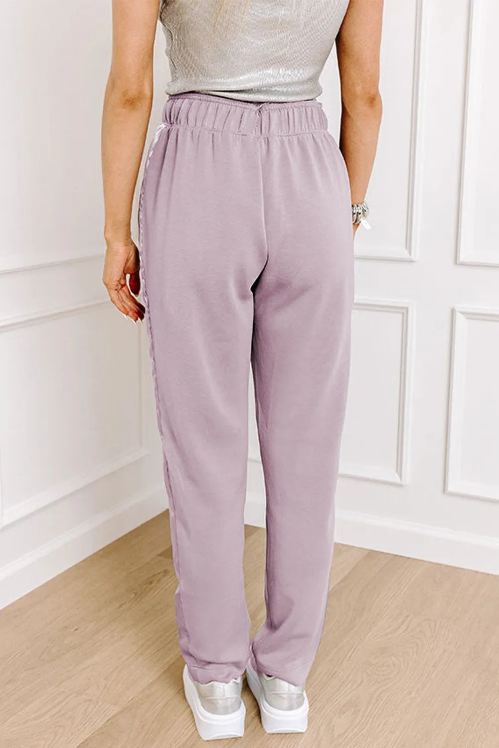 Drawstring pants with pockets, opaque.