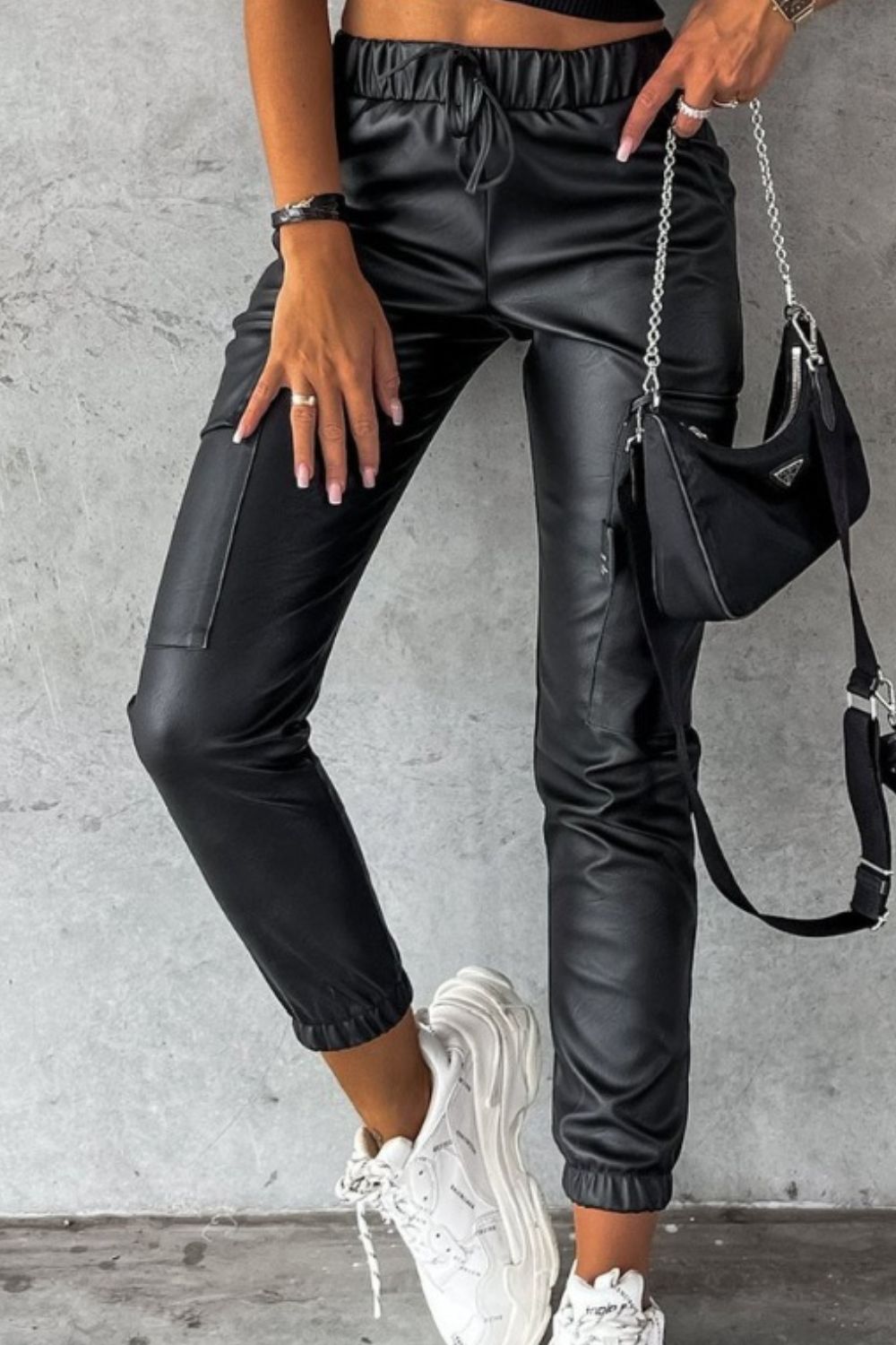 Drawstring pants with pockets, opaque.