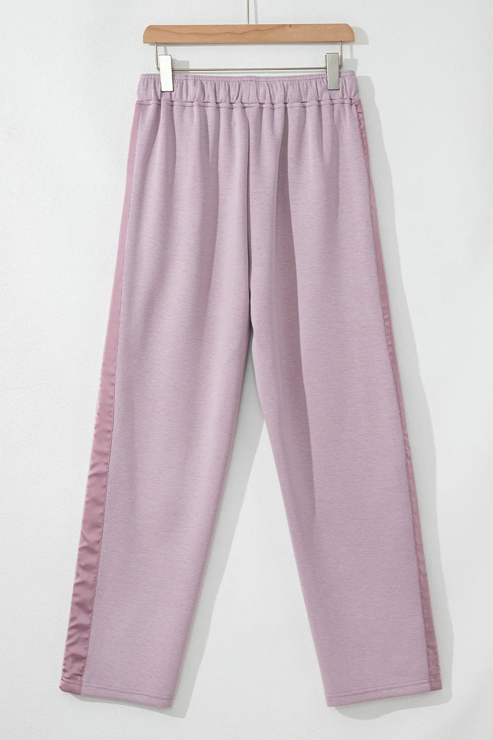Drawstring pants with pockets, opaque.