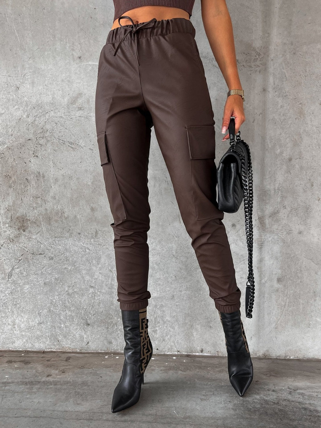 Drawstring pants with pockets, opaque.