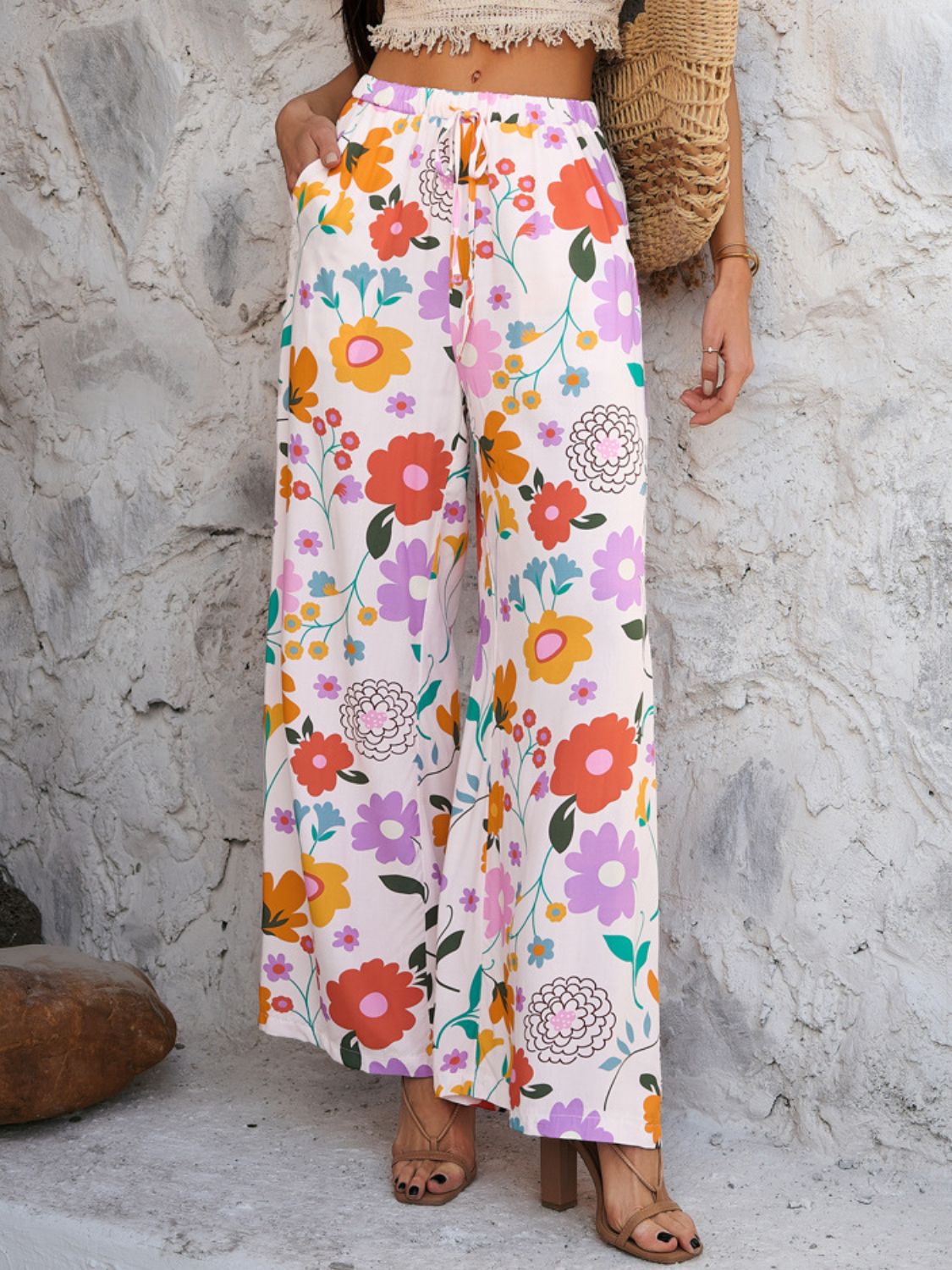 Drawstring printed wide leg pants with pockets, opaque.