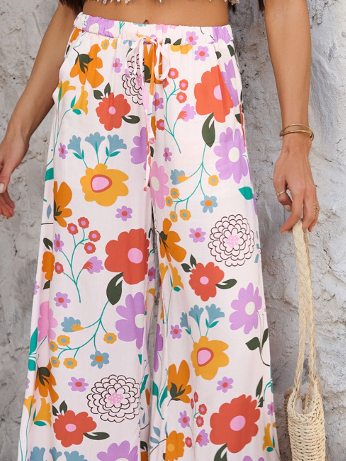 Drawstring printed wide leg pants with pockets, opaque.