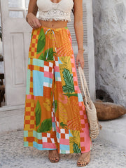Drawstring printed wide leg pants with pockets, opaque.