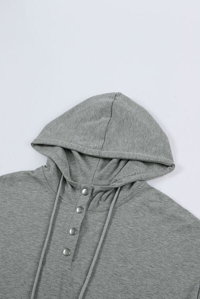 Drawstring quarter snap cap sleeve hoodie.