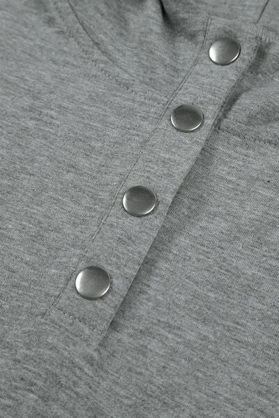 Drawstring quarter snap cap sleeve hoodie.