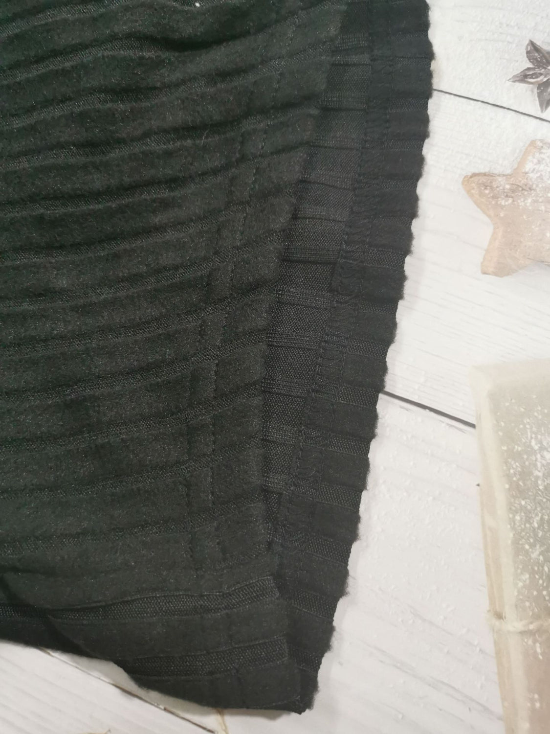 Drawstring ruched long sleeve ribbed top.
