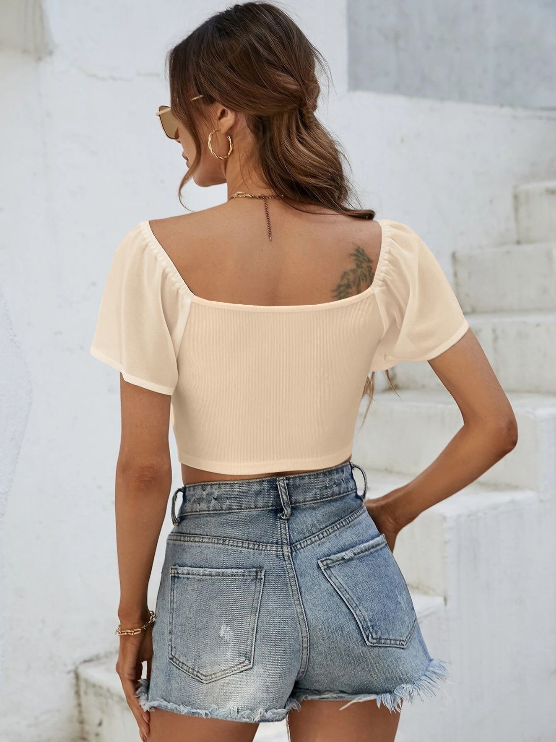 Drawstring short sleeve crop top.