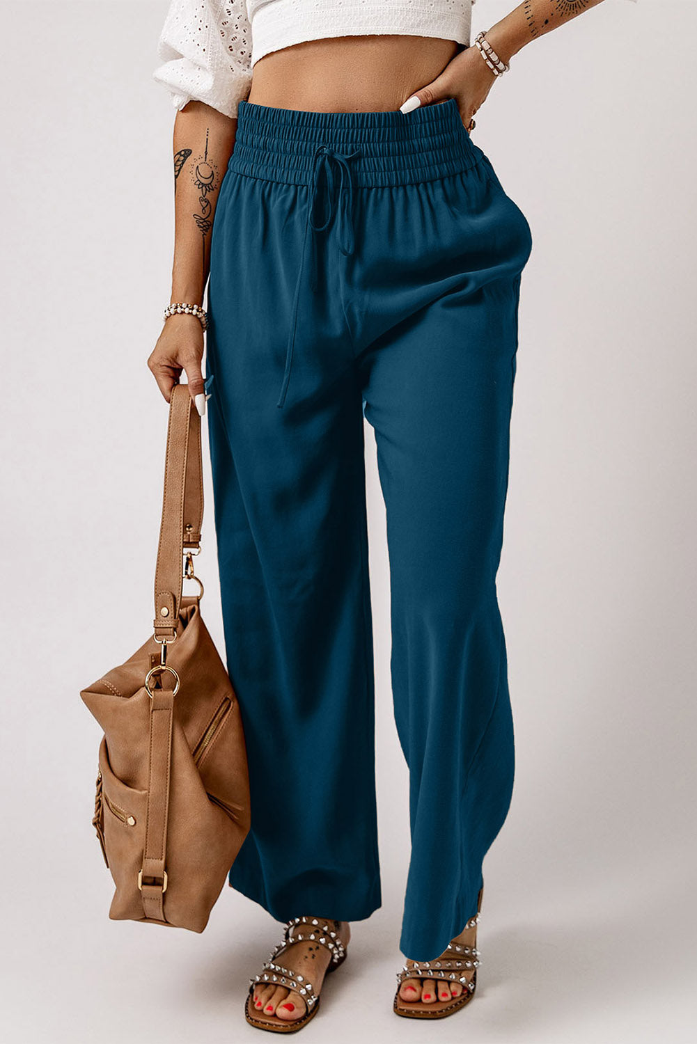 Drawstring smocked waist wide leg pants, solid chic and classy style.