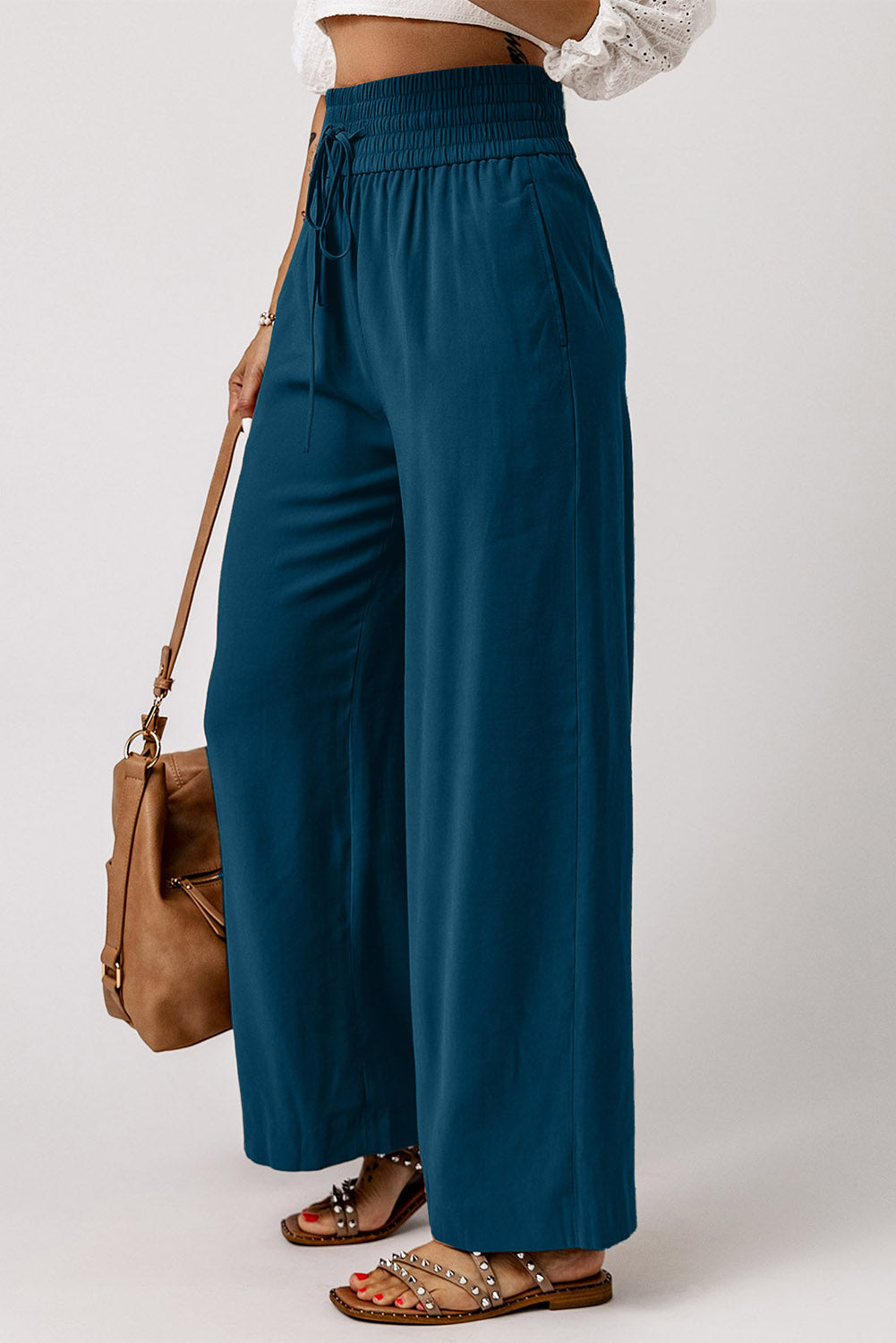 Drawstring smocked waist wide leg pants, solid chic and classy style.