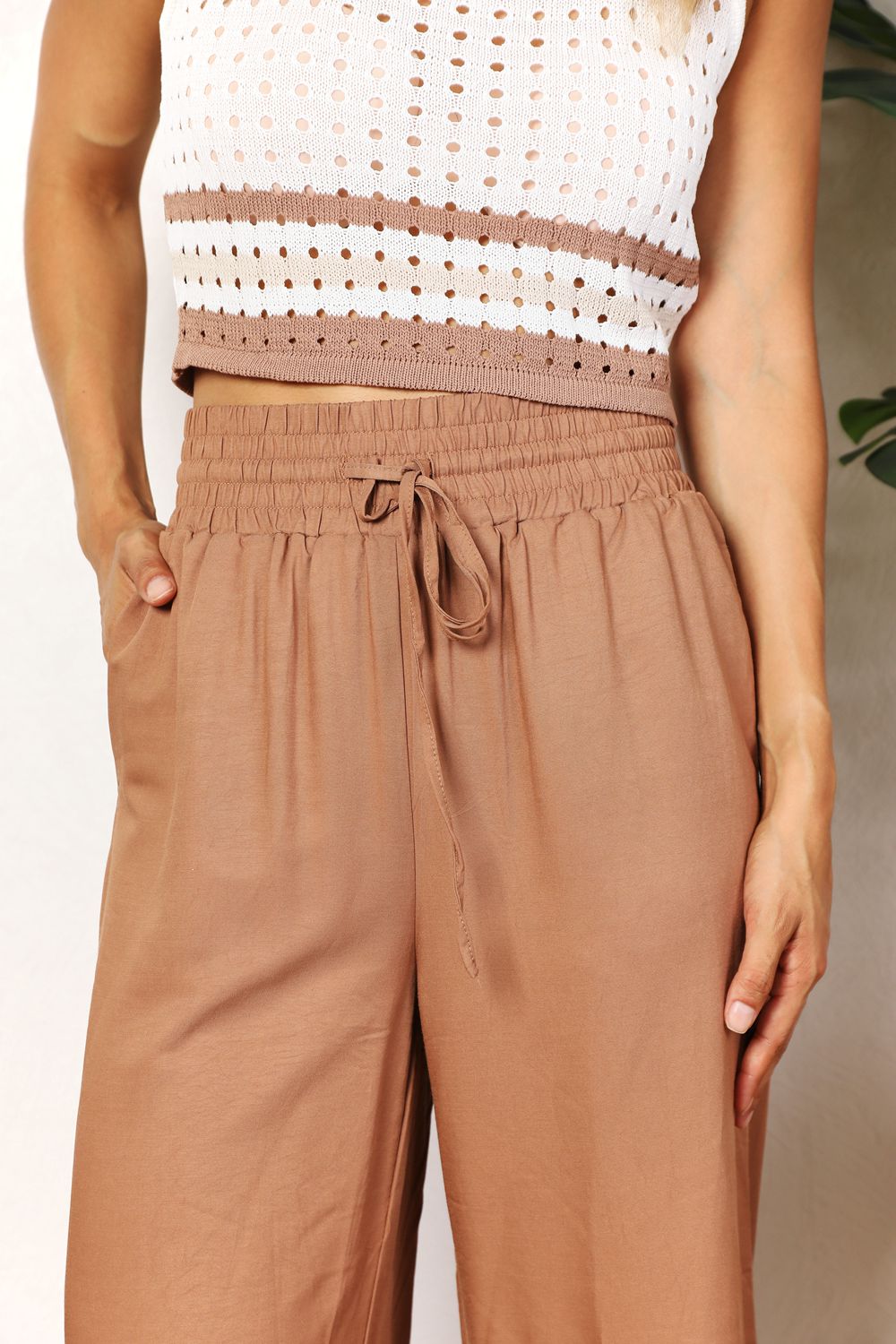 Drawstring smocked waist wide leg pants, solid chic style.