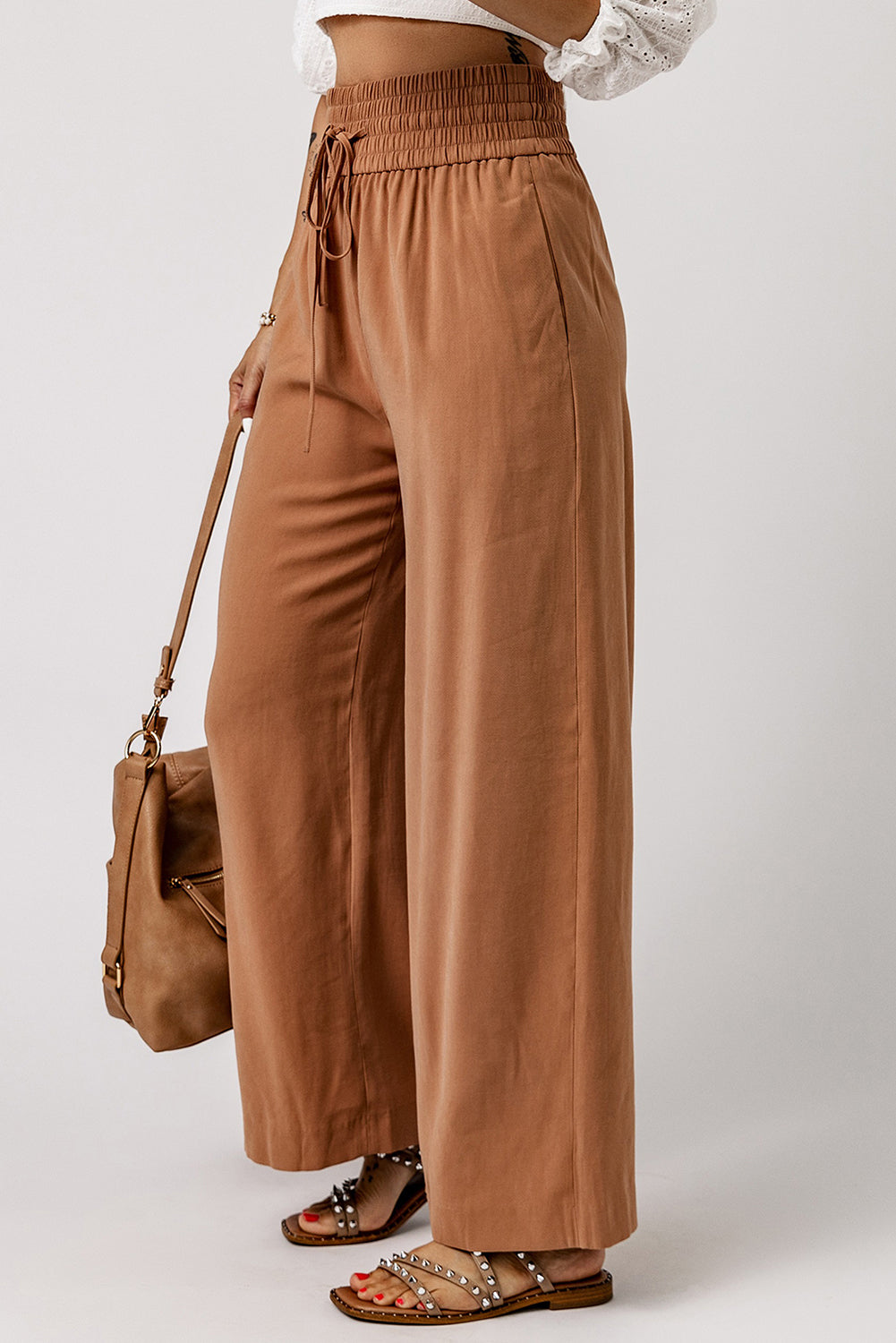 Drawstring smocked waist wide leg pants, solid chic and classy style.