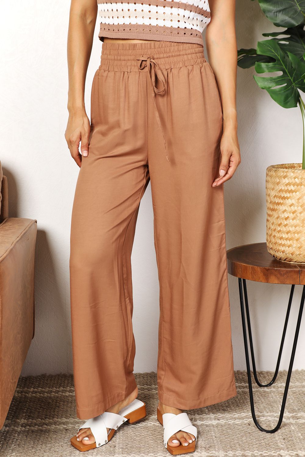 Drawstring smocked waist wide leg pants, solid chic style.