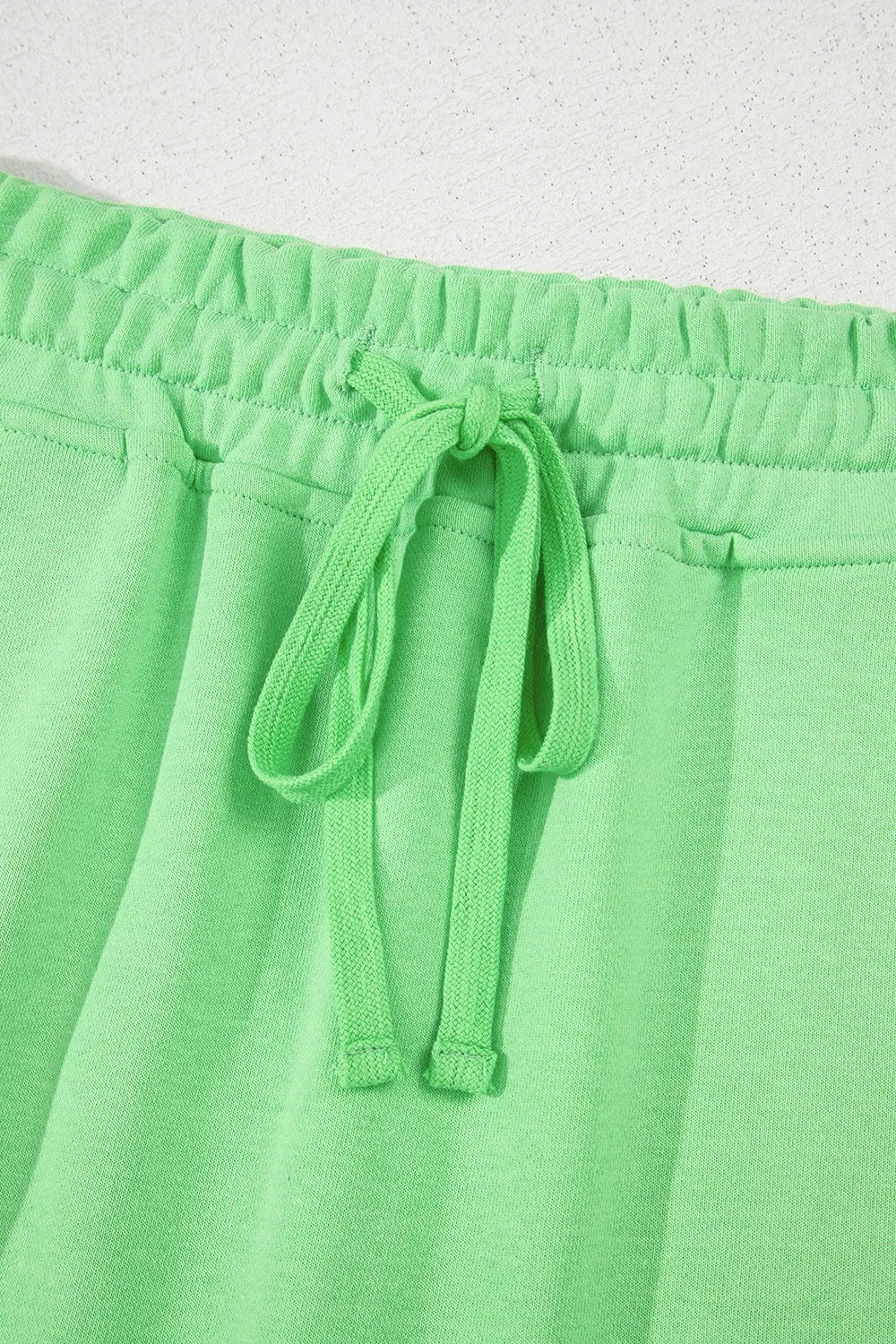 Drawstring solid mini skort.