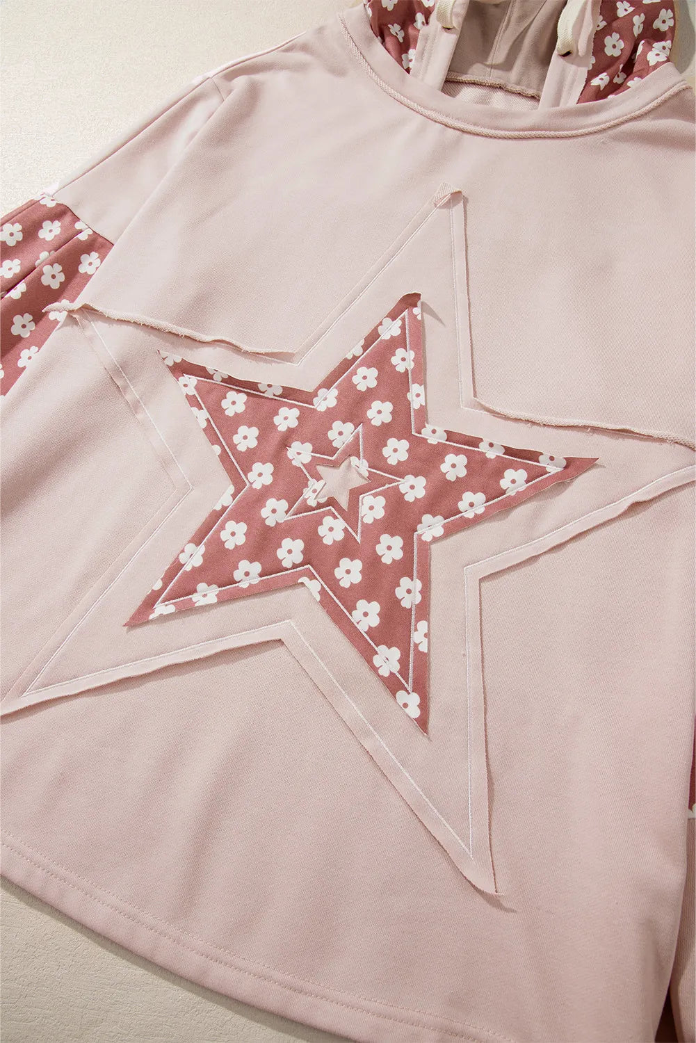 Drawstring star long sleeve hoodie.