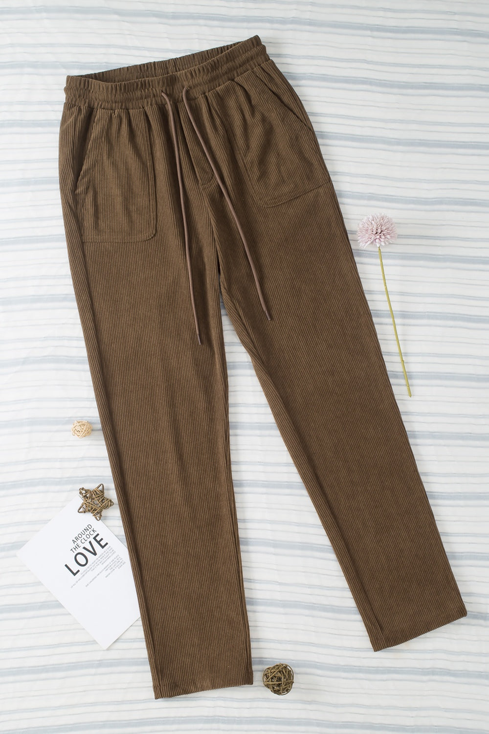 Drawstring straight pants with pockets, opaque.