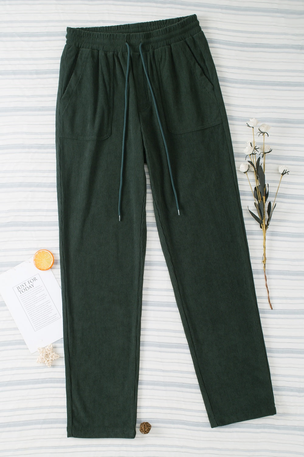 Drawstring straight pants with pockets, opaque.