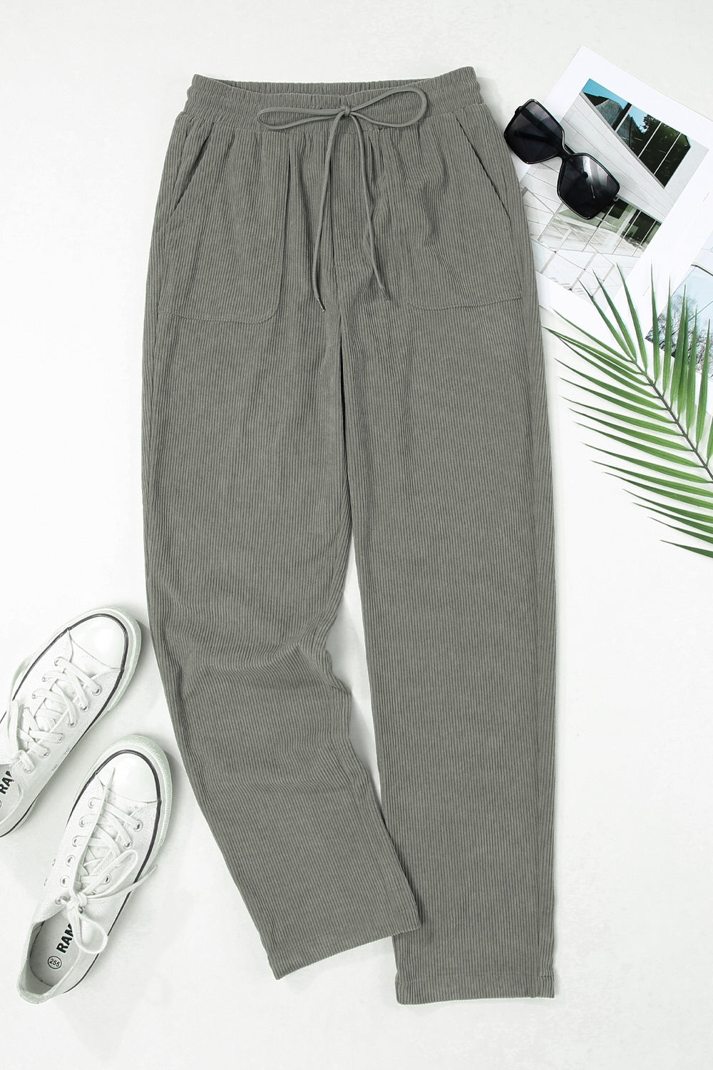 Drawstring straight pants with pockets, opaque.