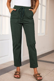 Drawstring straight pants with pockets, opaque.