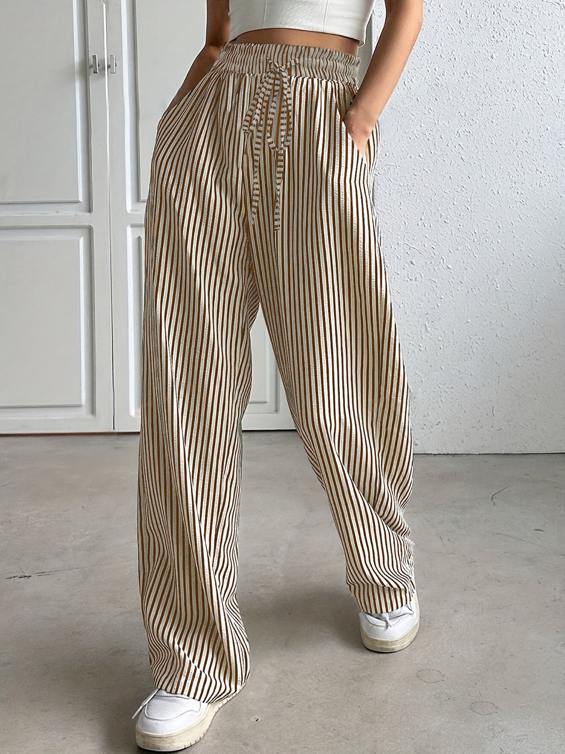 Drawstring striped elastic waist pants with pockets, opaque.