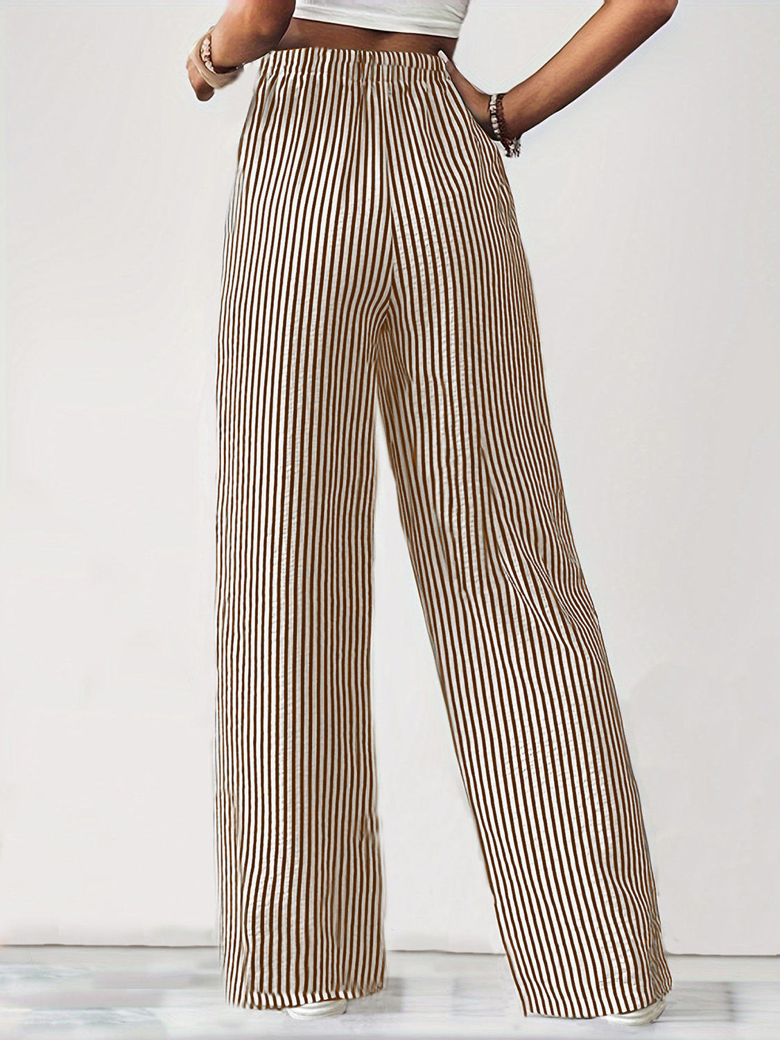 Drawstring striped elastic waist pants with pockets, opaque.