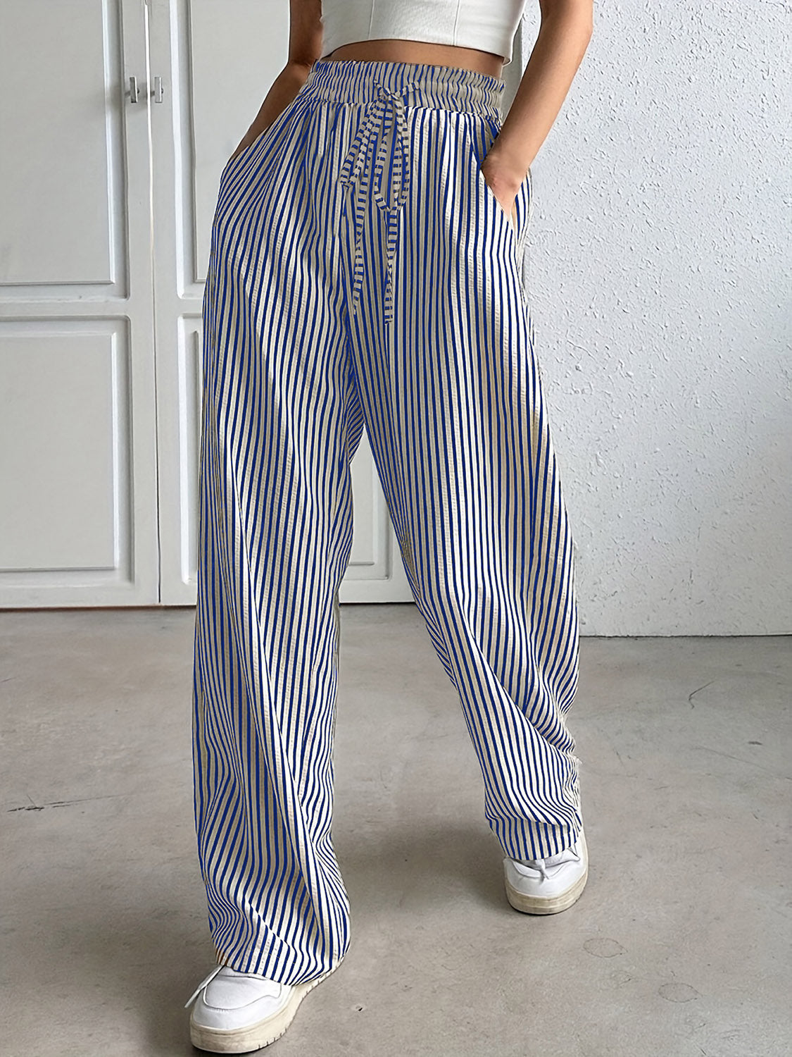Drawstring striped elastic waist pants with pockets, opaque.