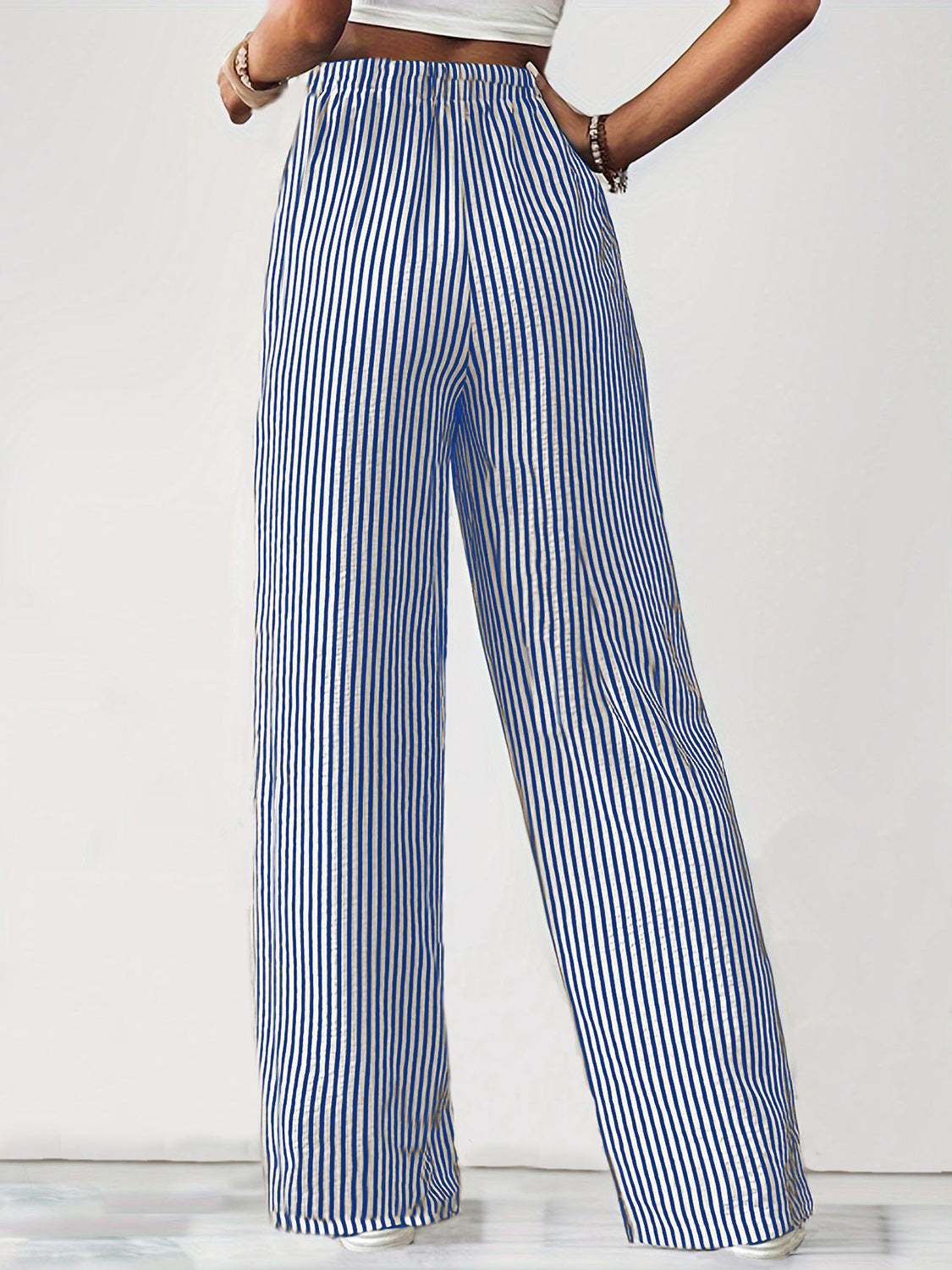 Drawstring striped elastic waist pants with pockets, opaque.