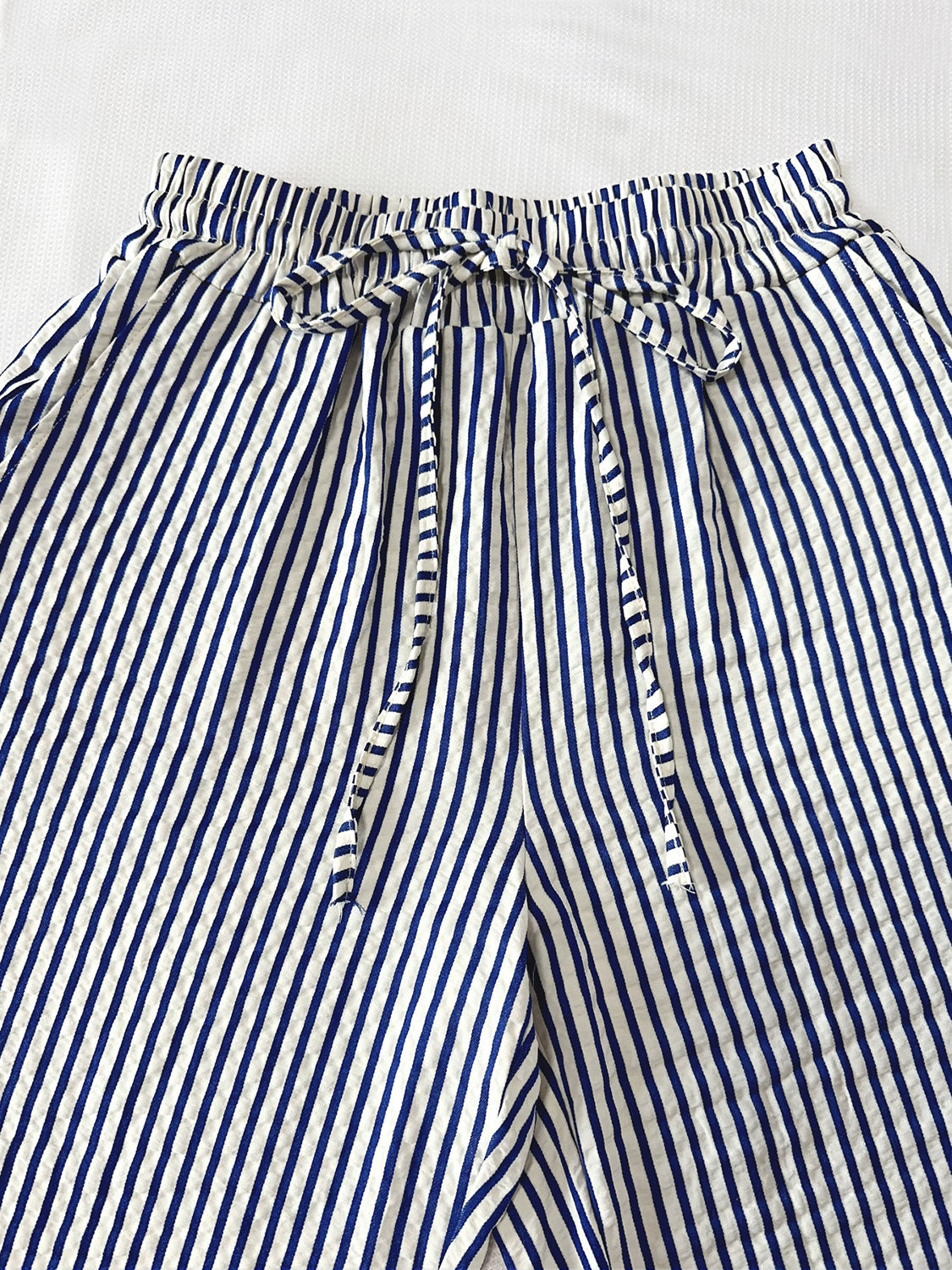 Drawstring striped elastic waist pants with pockets, opaque.