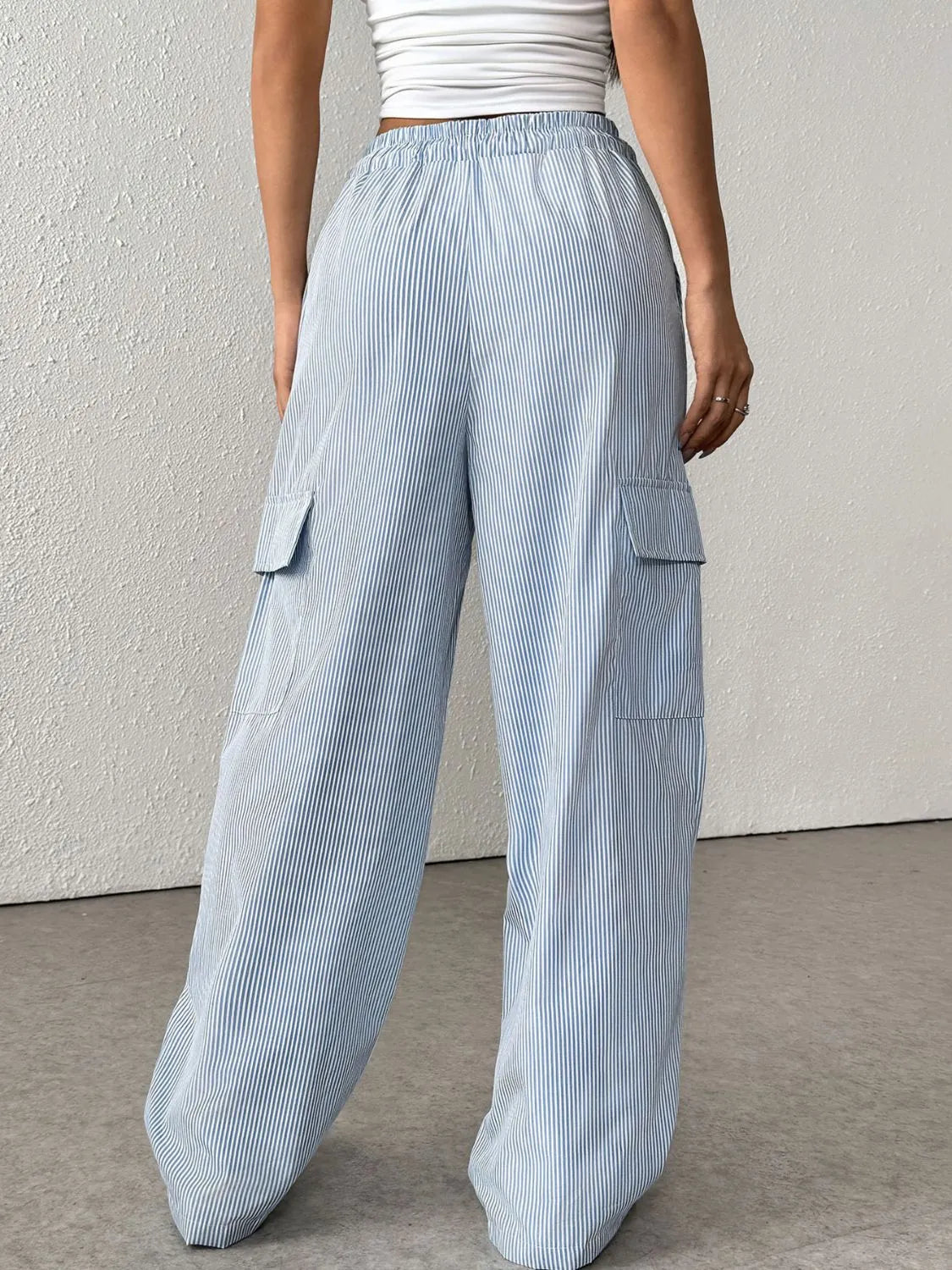 Drawstring striped wide leg cargo pants with pockets.